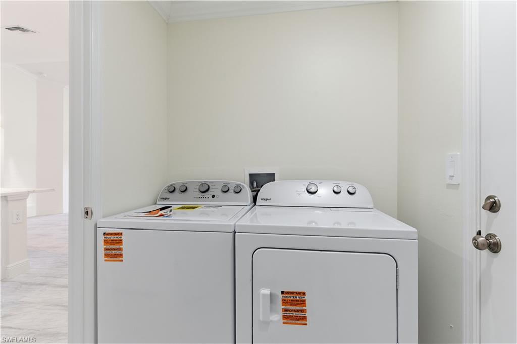 2141 Davis Street Fort Myers, FL 33916 - Photo 44 of 50 a utility room with dryer and washer