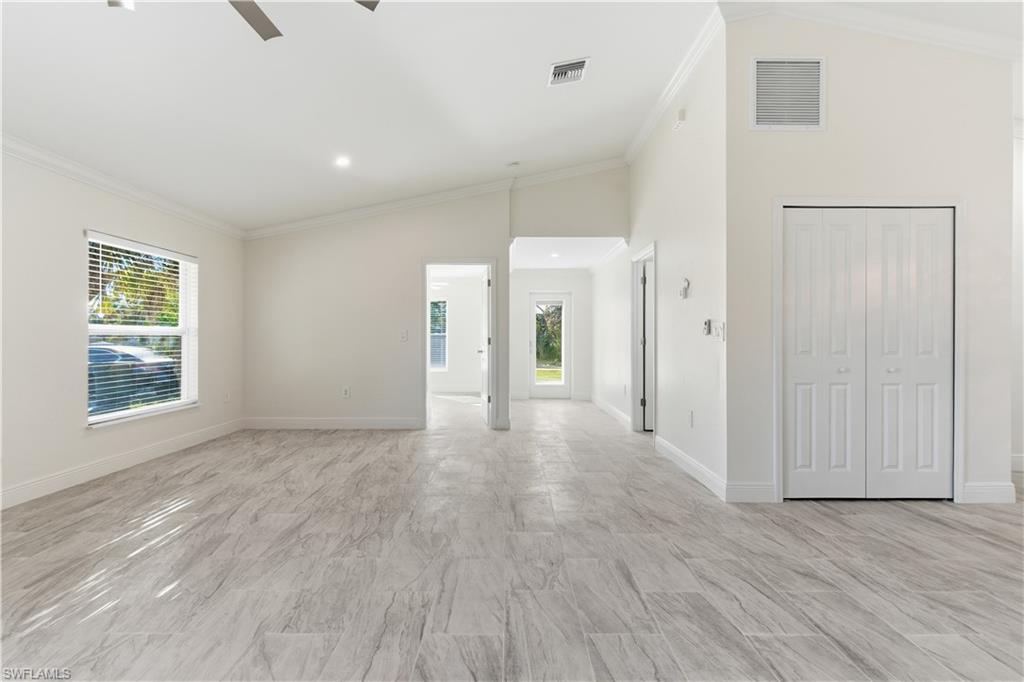 2141 Davis Street Fort Myers, FL 33916 - Photo 9 of 50 a view of a livingroom with wooden floor and window