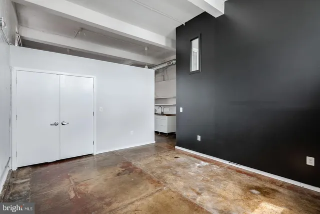 a front view of a building with multiple windows