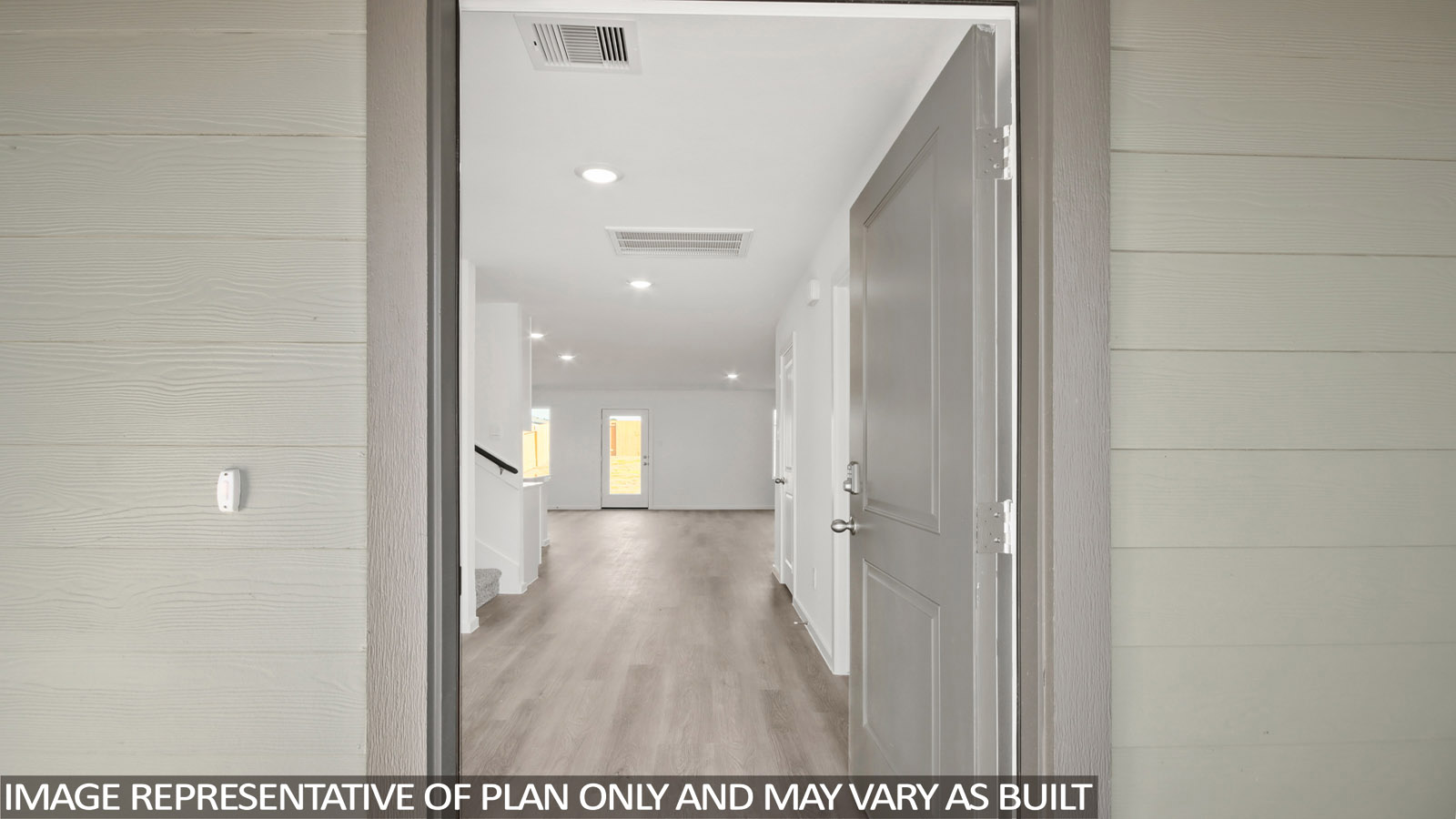 168 Baby Calf Roping Road Jarrell, TX 76537 - Photo 3 of 23 a view of a hallway with wooden floor