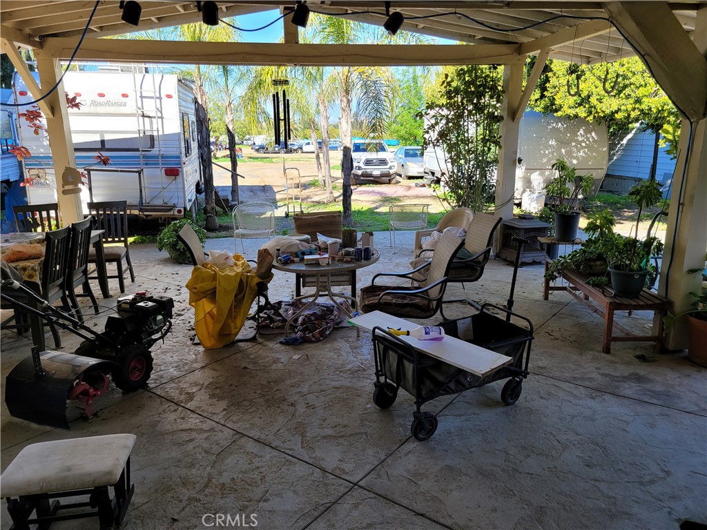 8805 Dufferin Avenue Riverside, CA 92504 - Photo 15 of 23 a building outdoor space with patio furniture and potted plants