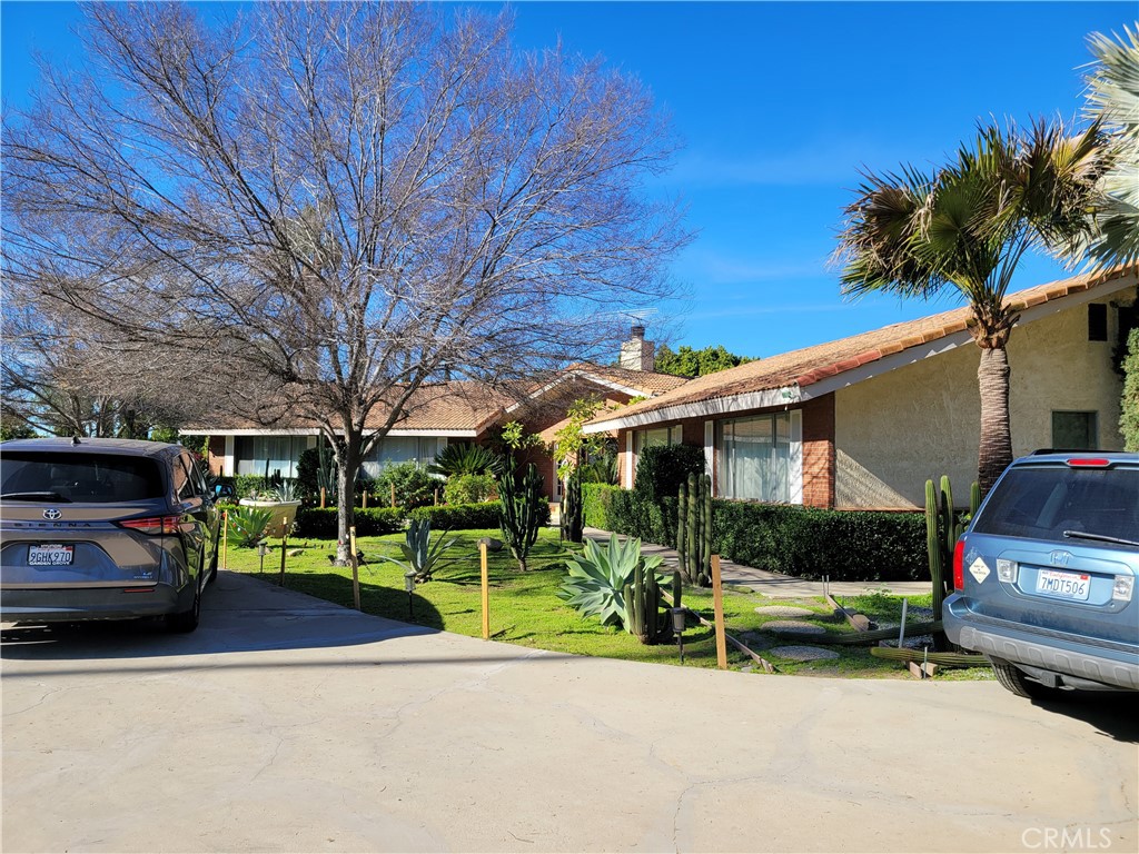 8805 Dufferin Avenue Riverside, CA 92504 - Photo 5 of 23 a view of a parked cars in front of a building
