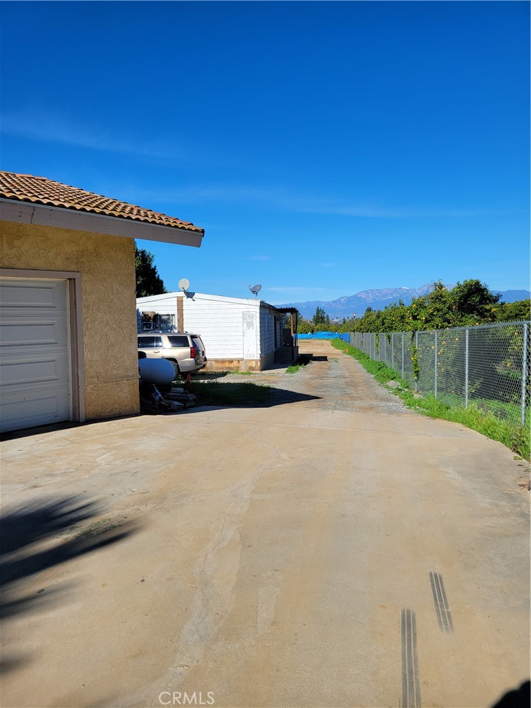 8805 Dufferin Avenue Riverside, CA 92504 - Photo 7 of 23 a view of a street with a road