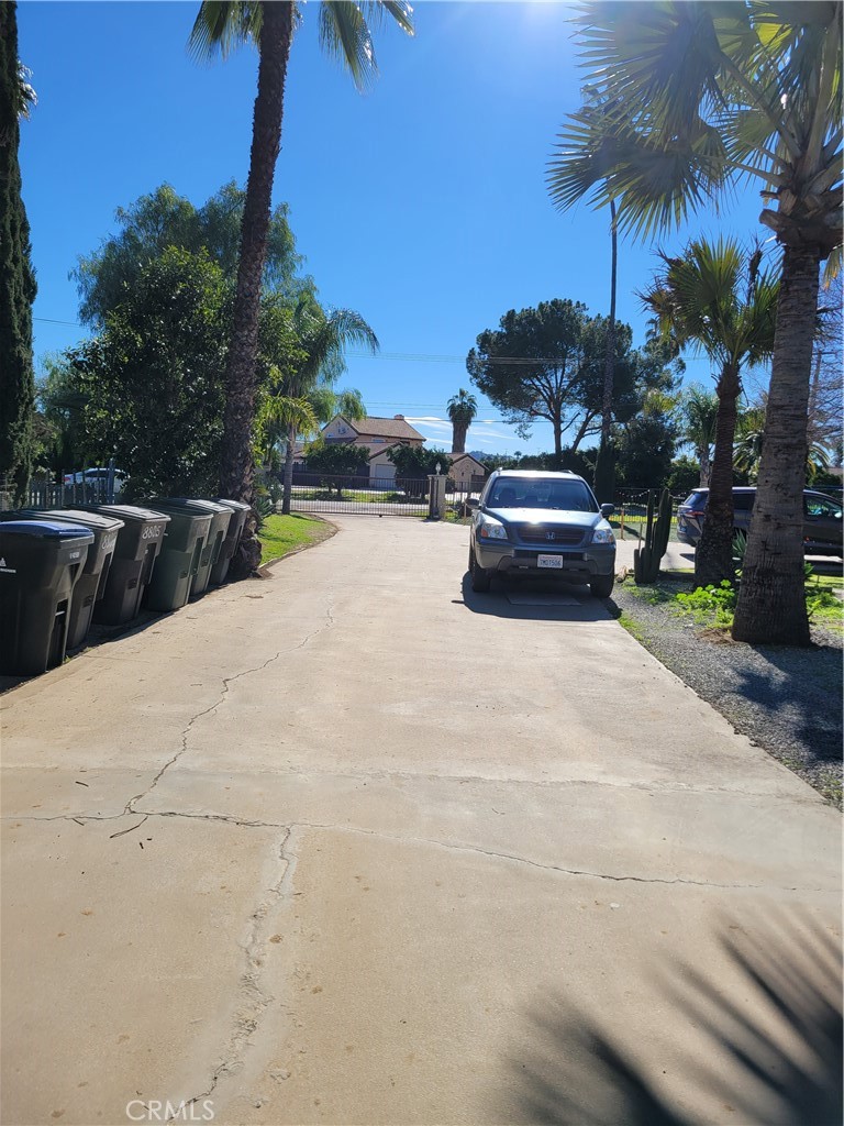8805 Dufferin Avenue Riverside, CA 92504 - Photo 9 of 23 a car parked on the side of the road