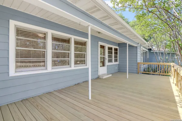a view of house with deck