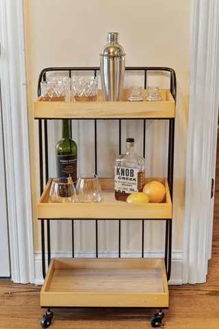 a view of bedroom with furniture and wooden floor