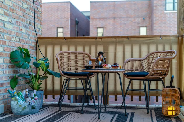 a view of balcony with outdoor seating