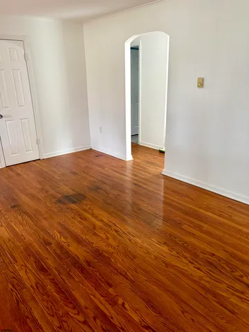 a kitchen with stainless steel appliances a sink window and a refrigerator
