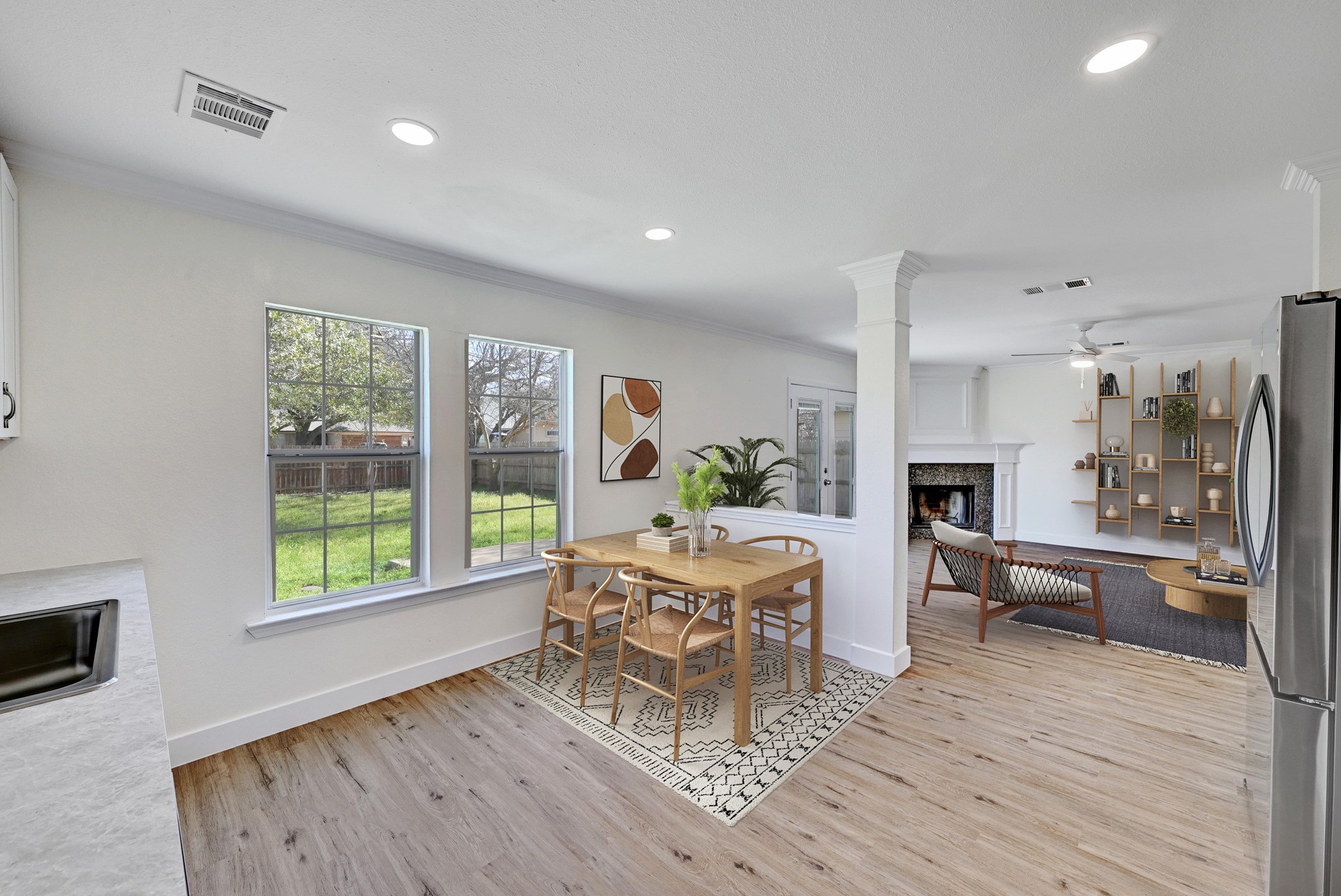 7413 L Marble Ridge Drive Austin, TX 78747 - Photo 30 of 30 Open-concept floor plan featuring light wood-finish flooring, recessed lighting, and white baseboards