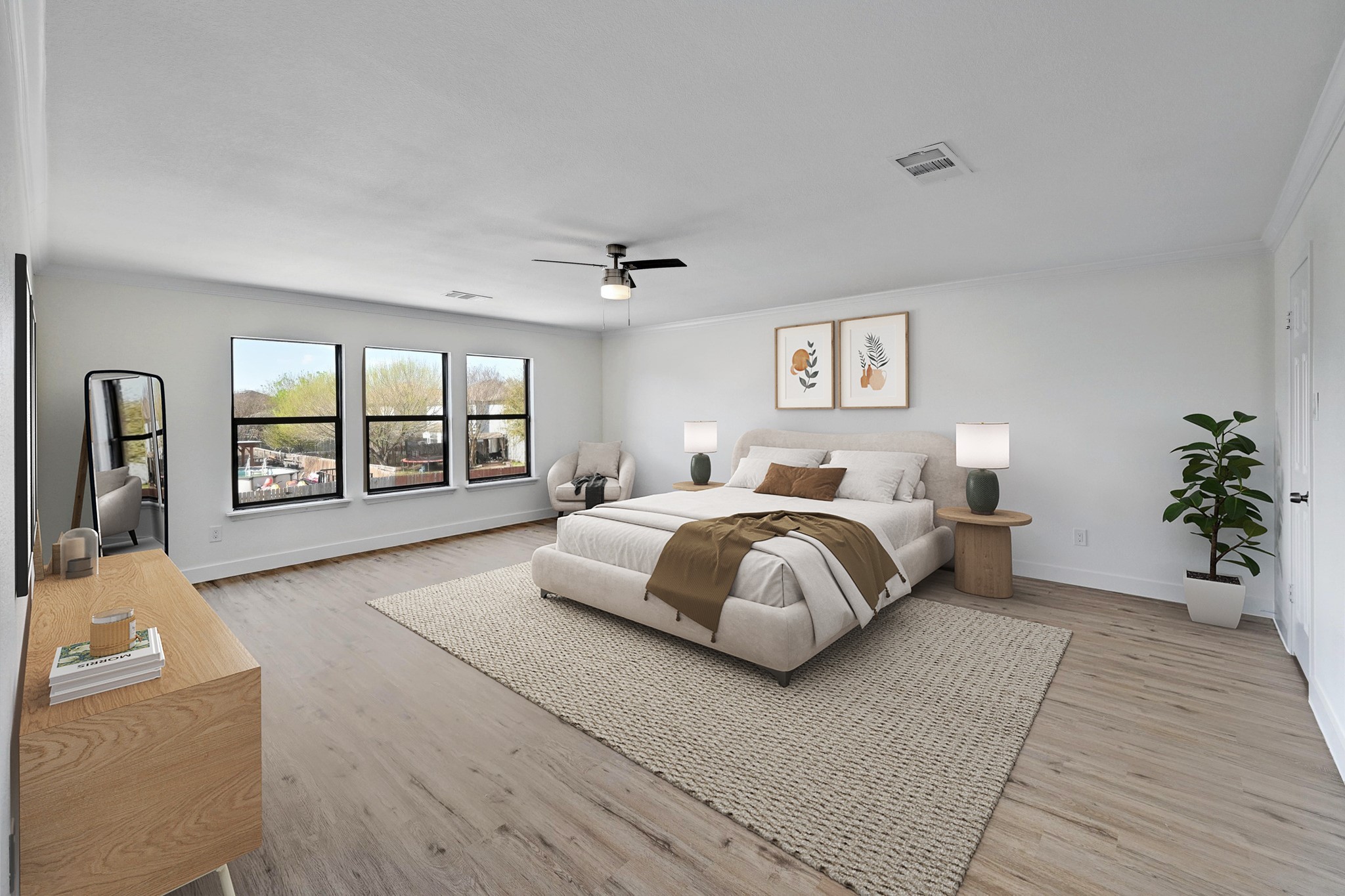 7413 L Marble Ridge Drive Austin, TX 78747 - Photo 12 of 30 Spacious bedroom featuring wood-finish flooring, ample natural light from multiple windows, a ceiling fan with integrated lighting, and crown molding