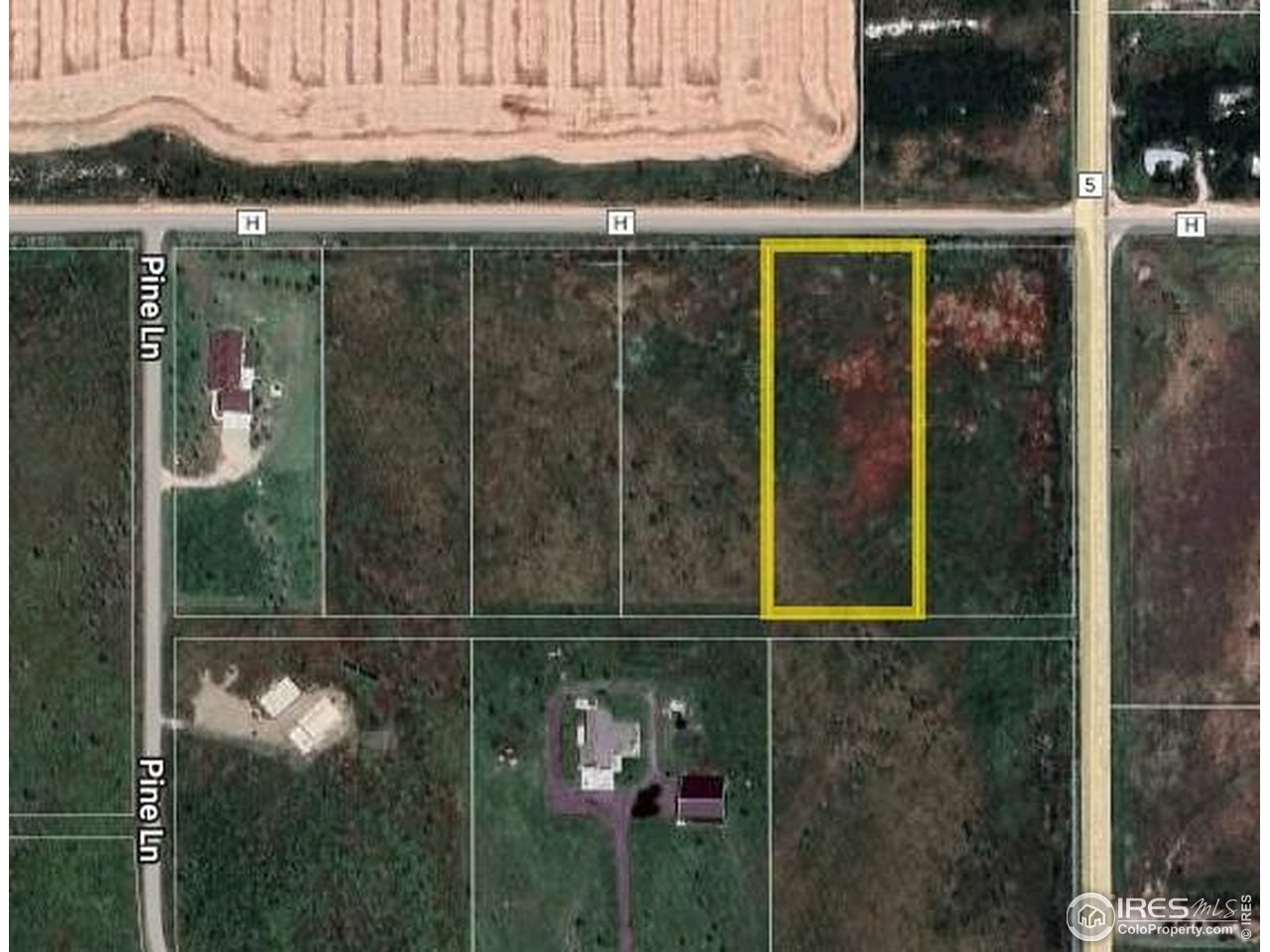 4952 County Road H Wiggins, CO 80654 - Photo 1 of 9 a bathroom with a granite countertop sink and mirror