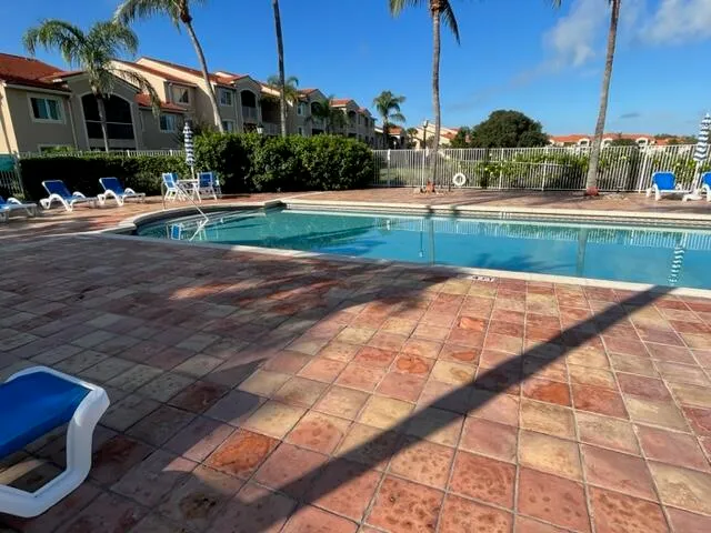 a view of yard with swimming pool