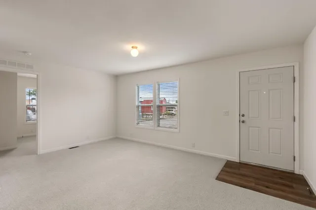 an empty room with windows