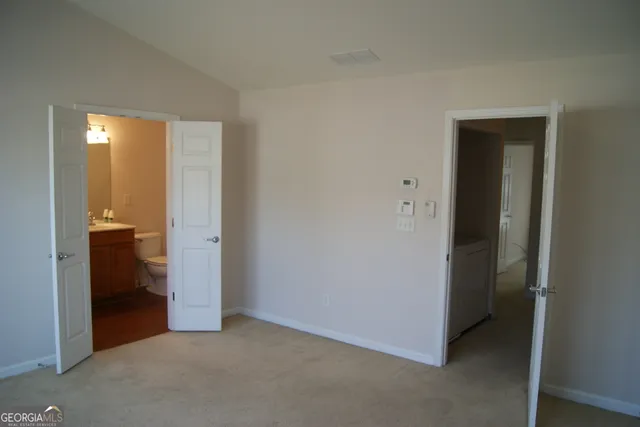 an empty room and closet