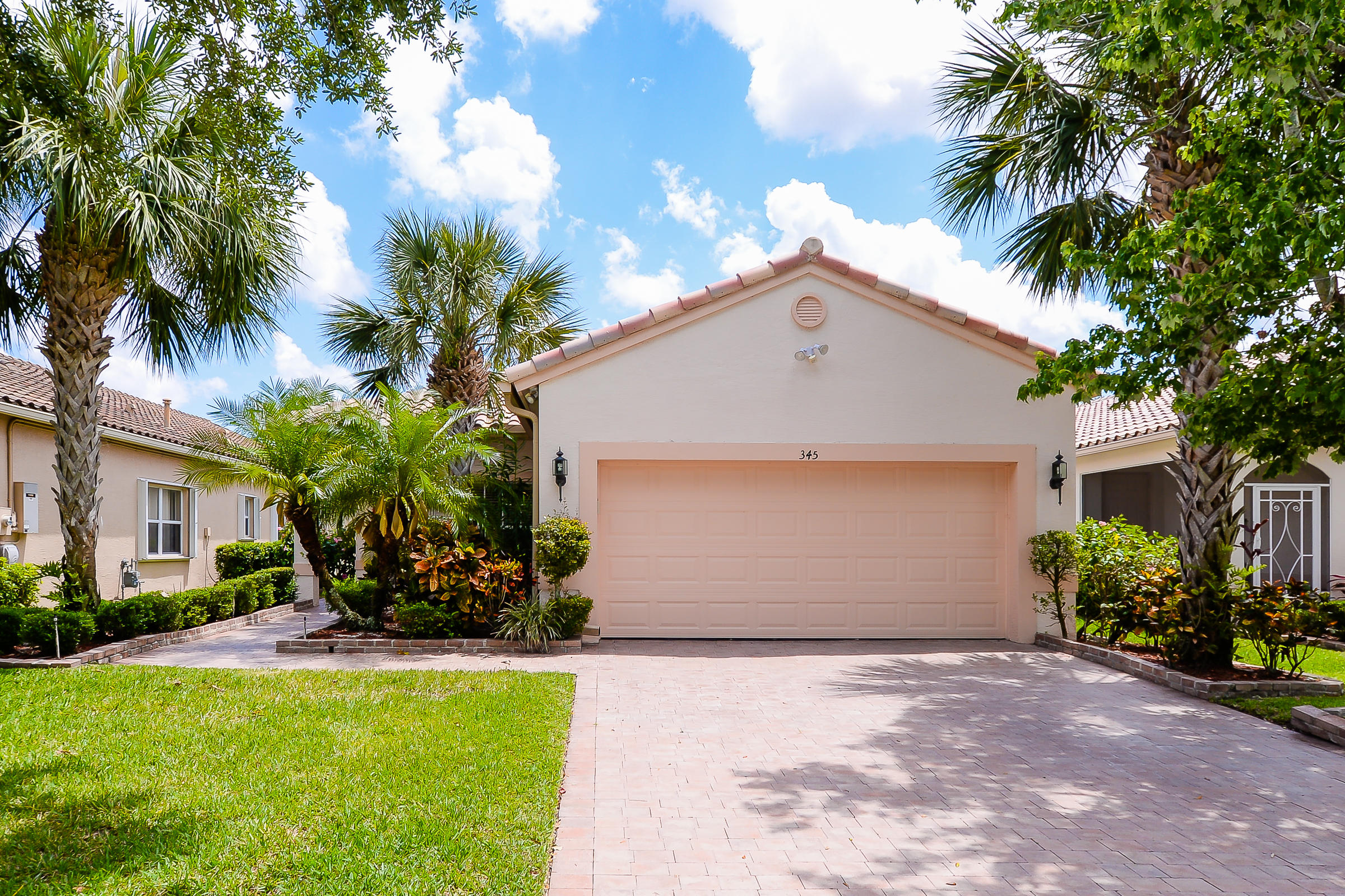 345 Northwest Breezy Point Loop Port St. Lucie, FL 34986 - Photo 2 of 42 2nd front