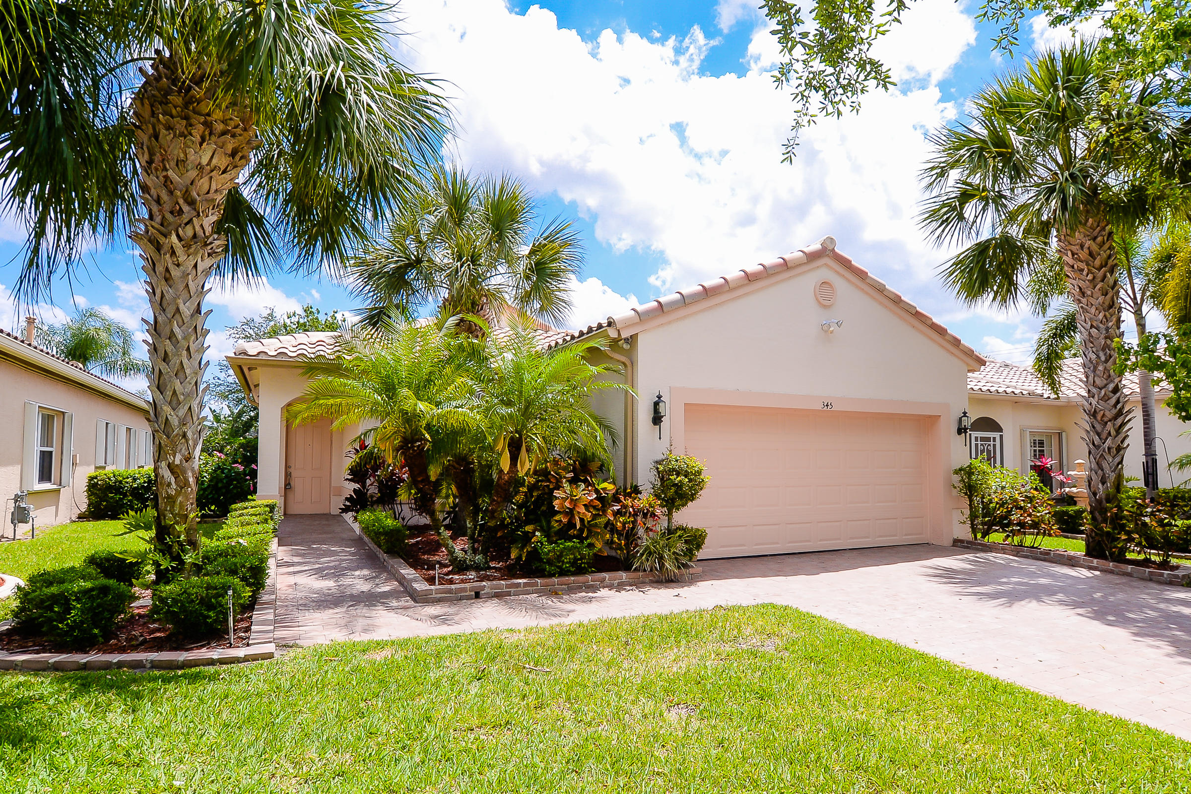 345 Northwest Breezy Point Loop Port St. Lucie, FL 34986 - Photo 3 of 42 3rd front