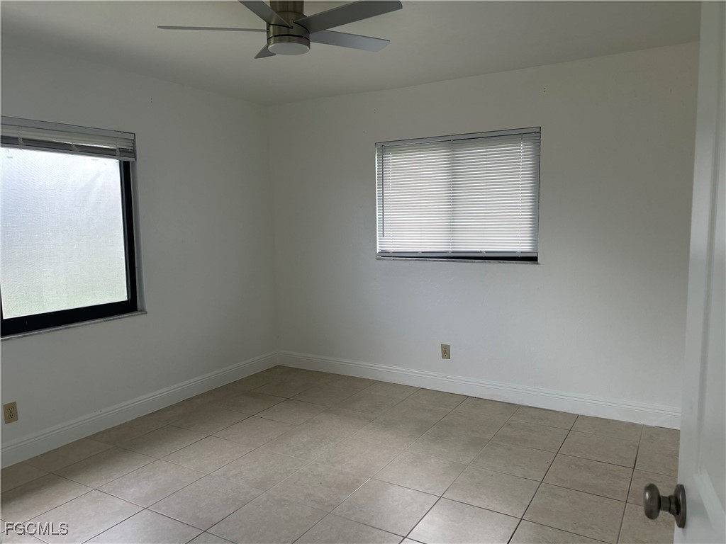 729 Southwest 46th Street Cape Coral, FL 33914 - Photo 16 of 20 a view of room and window