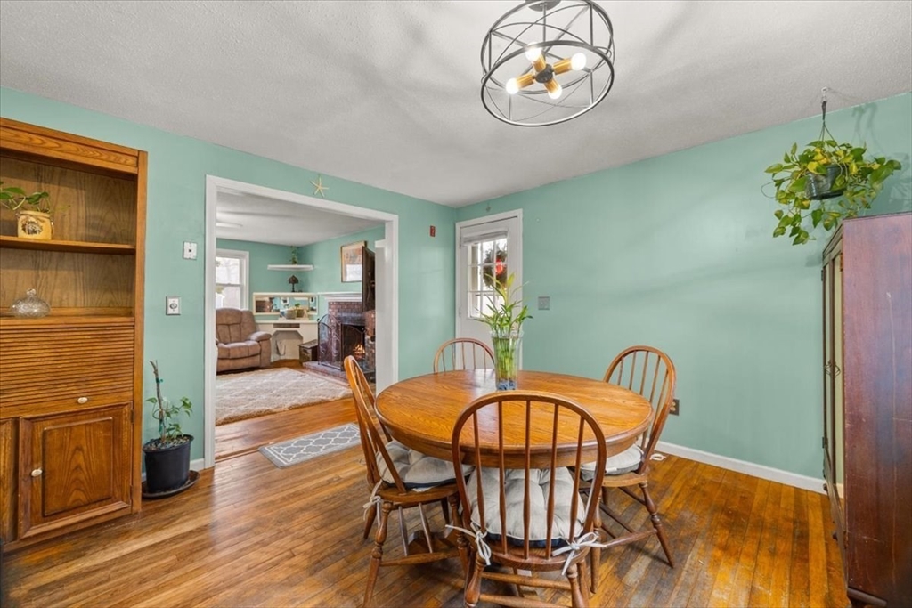 281 Megan Road Barnstable, MA 02601 - Photo 16 of 36 a dining room with furniture and wooden floor