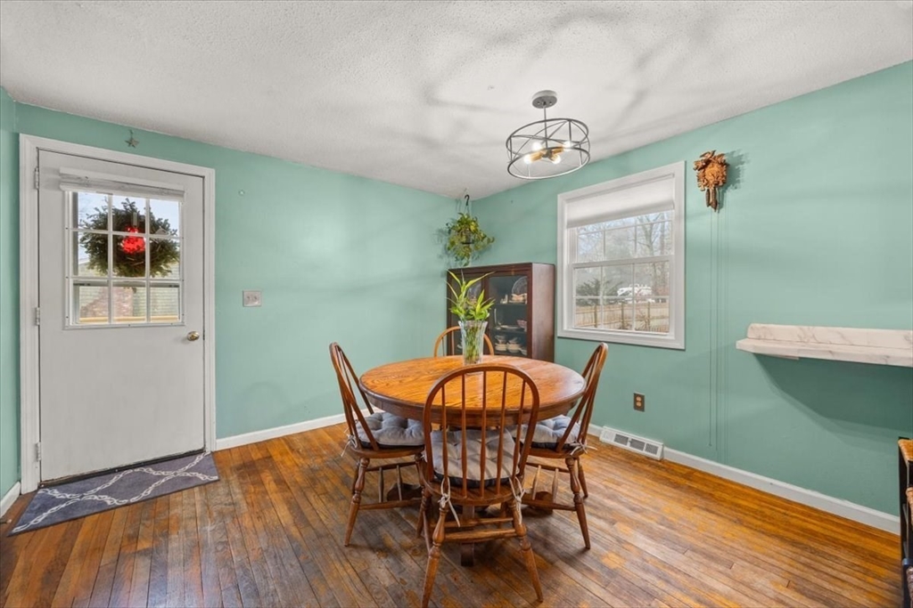 281 Megan Road Barnstable, MA 02601 - Photo 18 of 36 a view of a dining room with furniture window and wooden floor