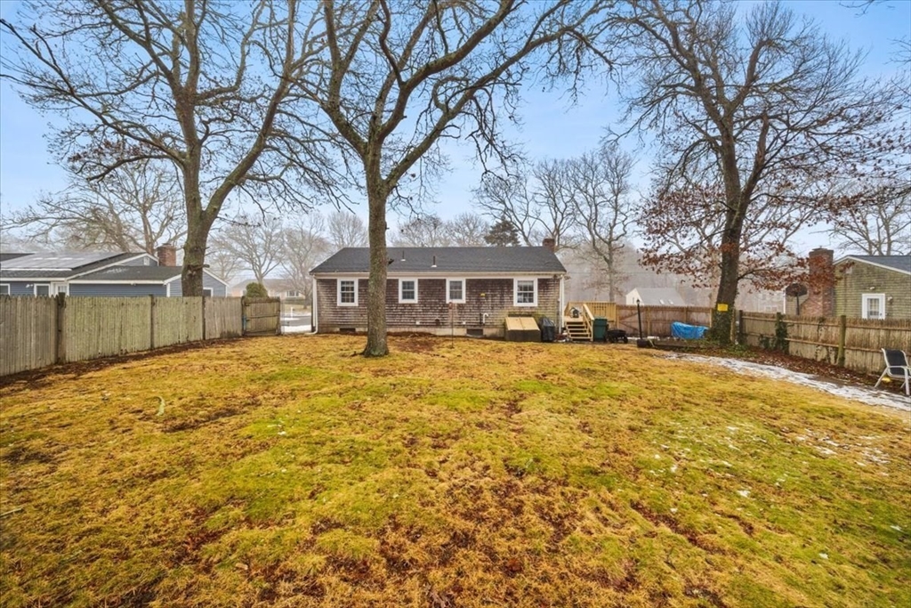 281 Megan Road Barnstable, MA 02601 - Photo 3 of 36 a house with trees in front of it