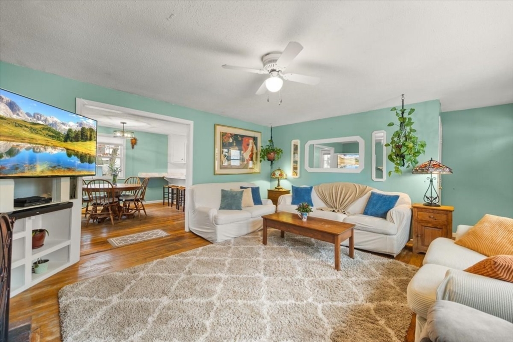 281 Megan Road Barnstable, MA 02601 - Photo 7 of 36 a living room with furniture and a flat screen tv