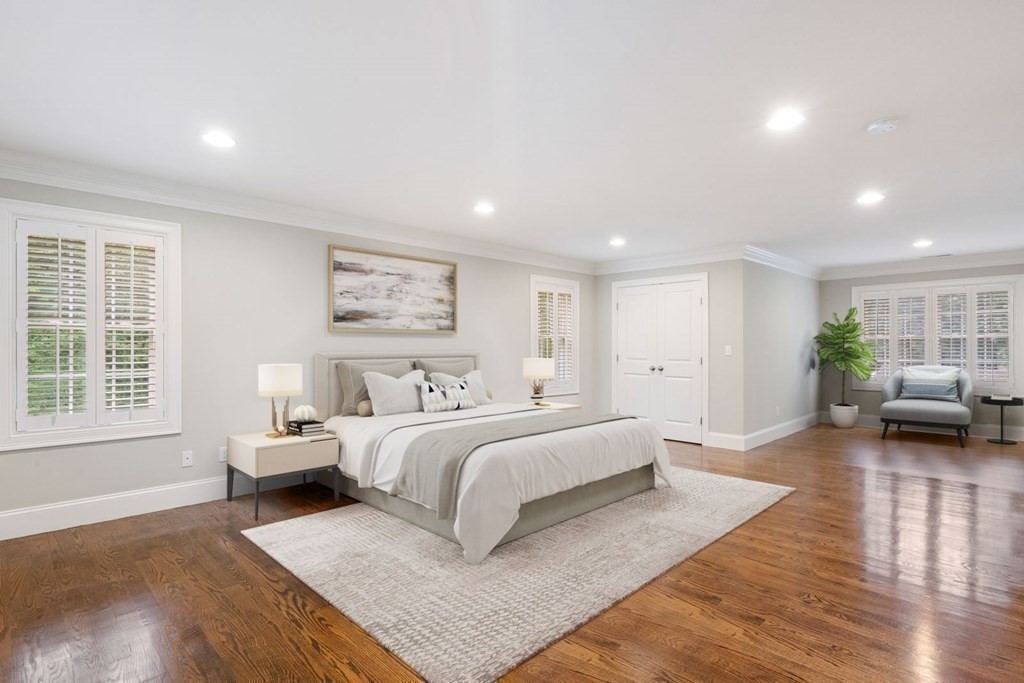 5 Bennett Road Wayland, MA 01778 - Photo 13 of 28 a spacious bedroom with a large bed and a couch