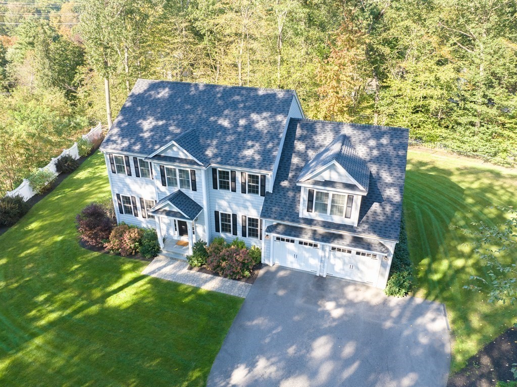 5 Bennett Road Wayland, MA 01778 - Photo 2 of 28 a aerial view of a house next to a big yard and large trees
