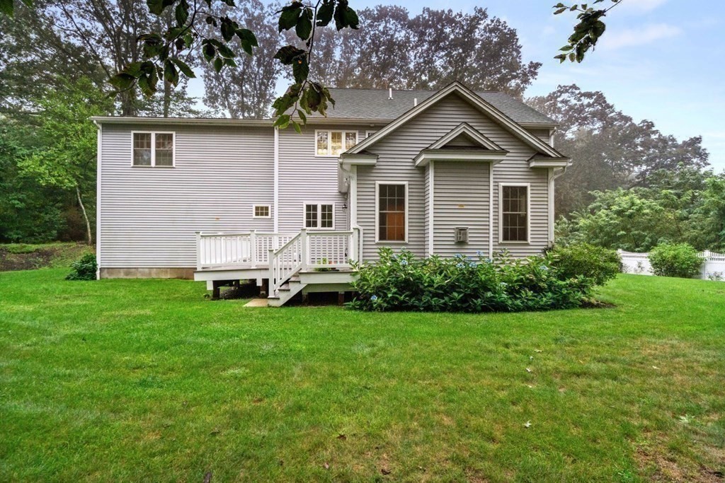 5 Bennett Road Wayland, MA 01778 - Photo 24 of 28 a front view of house with yard and green space