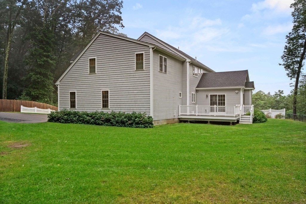 5 Bennett Road Wayland, MA 01778 - Photo 25 of 28 a view of a house with backyard