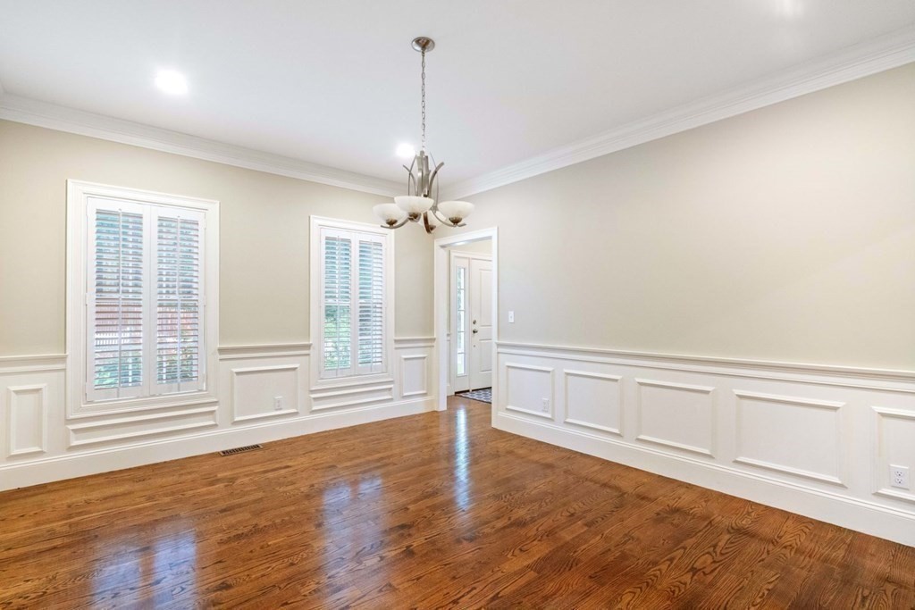 5 Bennett Road Wayland, MA 01778 - Photo 8 of 28 a view of empty room with wooden floor and fan