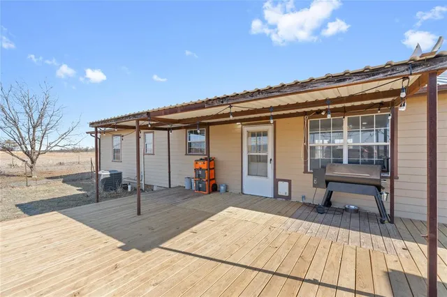 a front view of a house with a patio