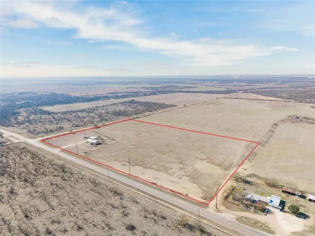 an empty room with an ocean view