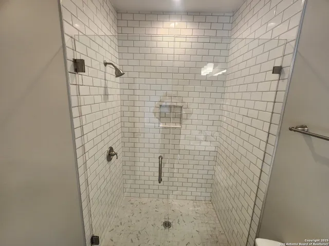 a view of small space with racks on the wall