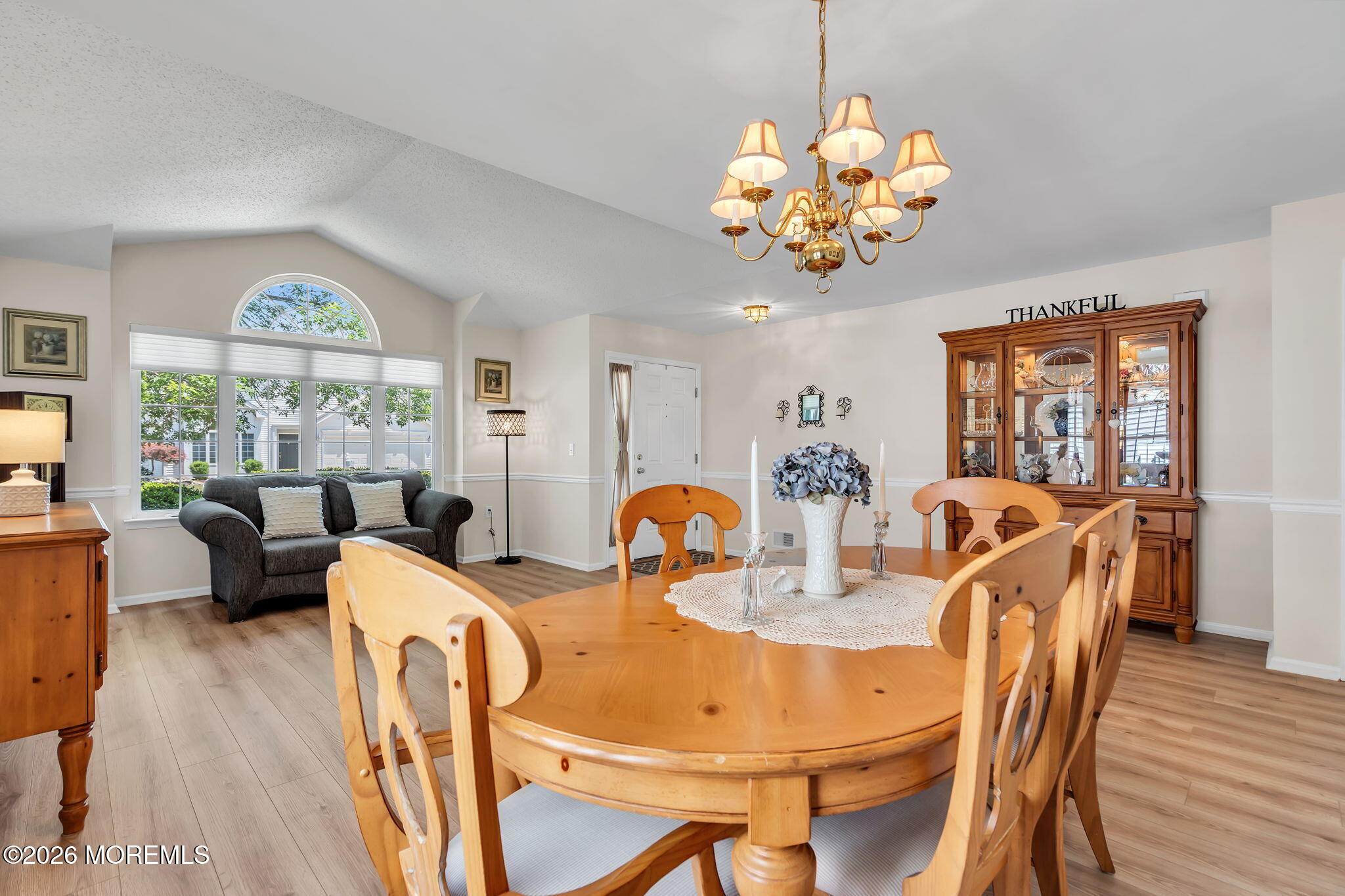 10 Congressional Road Jackson, NJ 08527 - Photo 12 of 72 a view of a dining room with furniture a chandelier and wooden floor