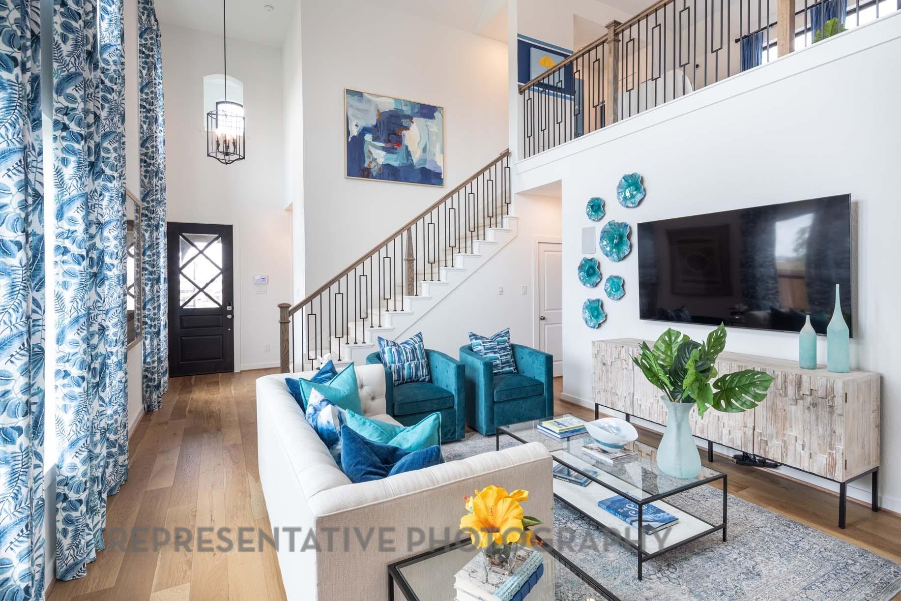 2426 Guava Hls Lane Manvel, TX 77578 - Photo 11 of 48 a living room with furniture and a flat screen tv