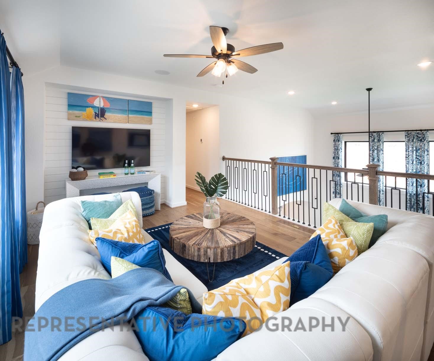 2426 Guava Hls Lane Manvel, TX 77578 - Photo 31 of 48 a living room with furniture and a flat screen tv