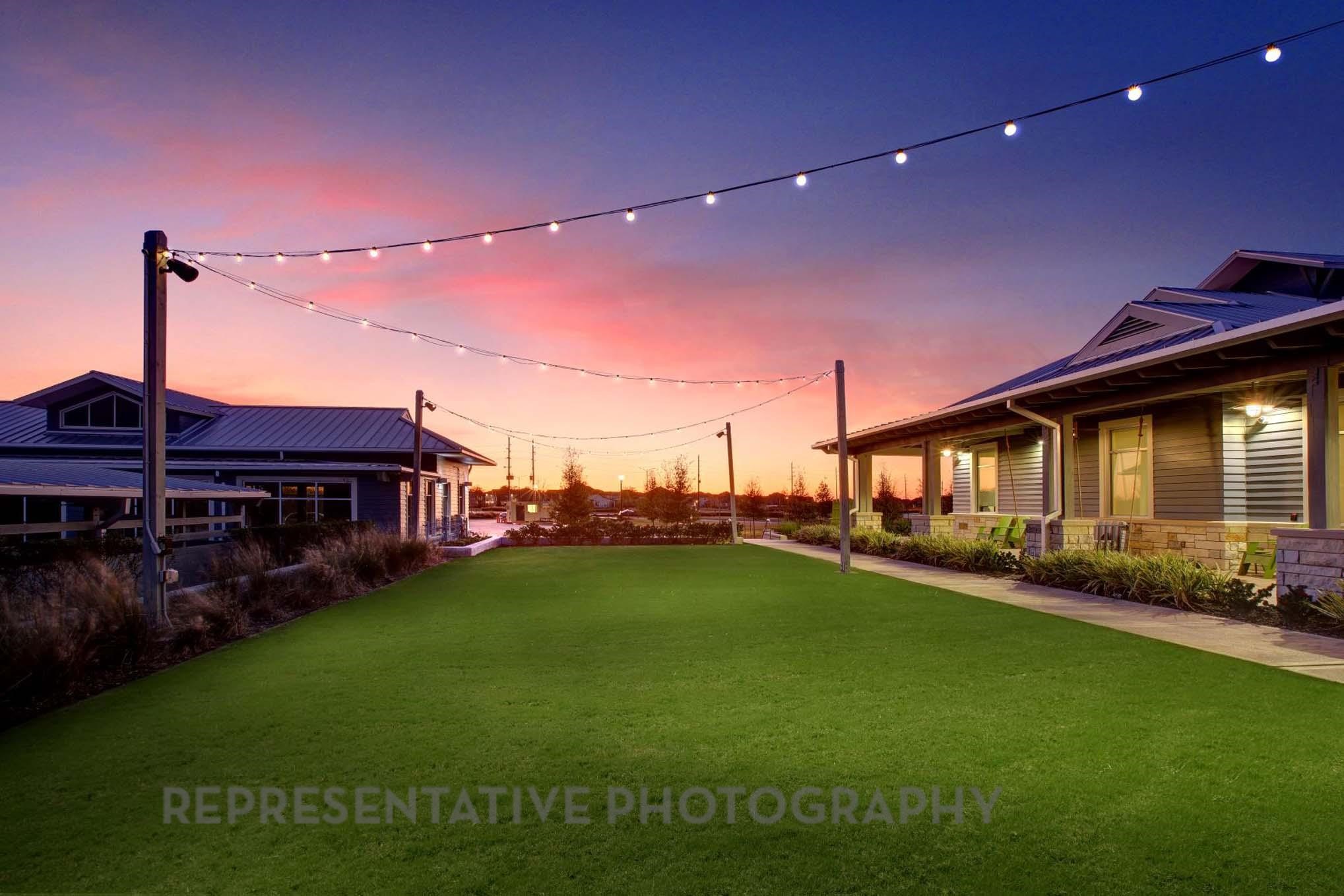2426 Guava Hls Lane Manvel, TX 77578 - Photo 42 of 48 a view of a house with a backyard and a patio