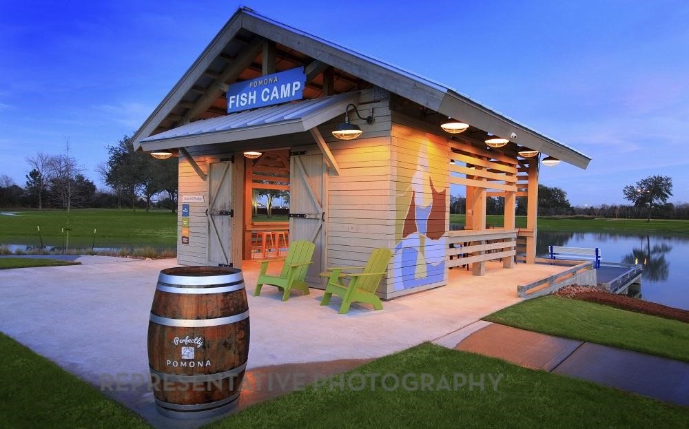 2426 Guava Hls Lane Manvel, TX 77578 - Photo 44 of 48 a front view of a house with garden and patio