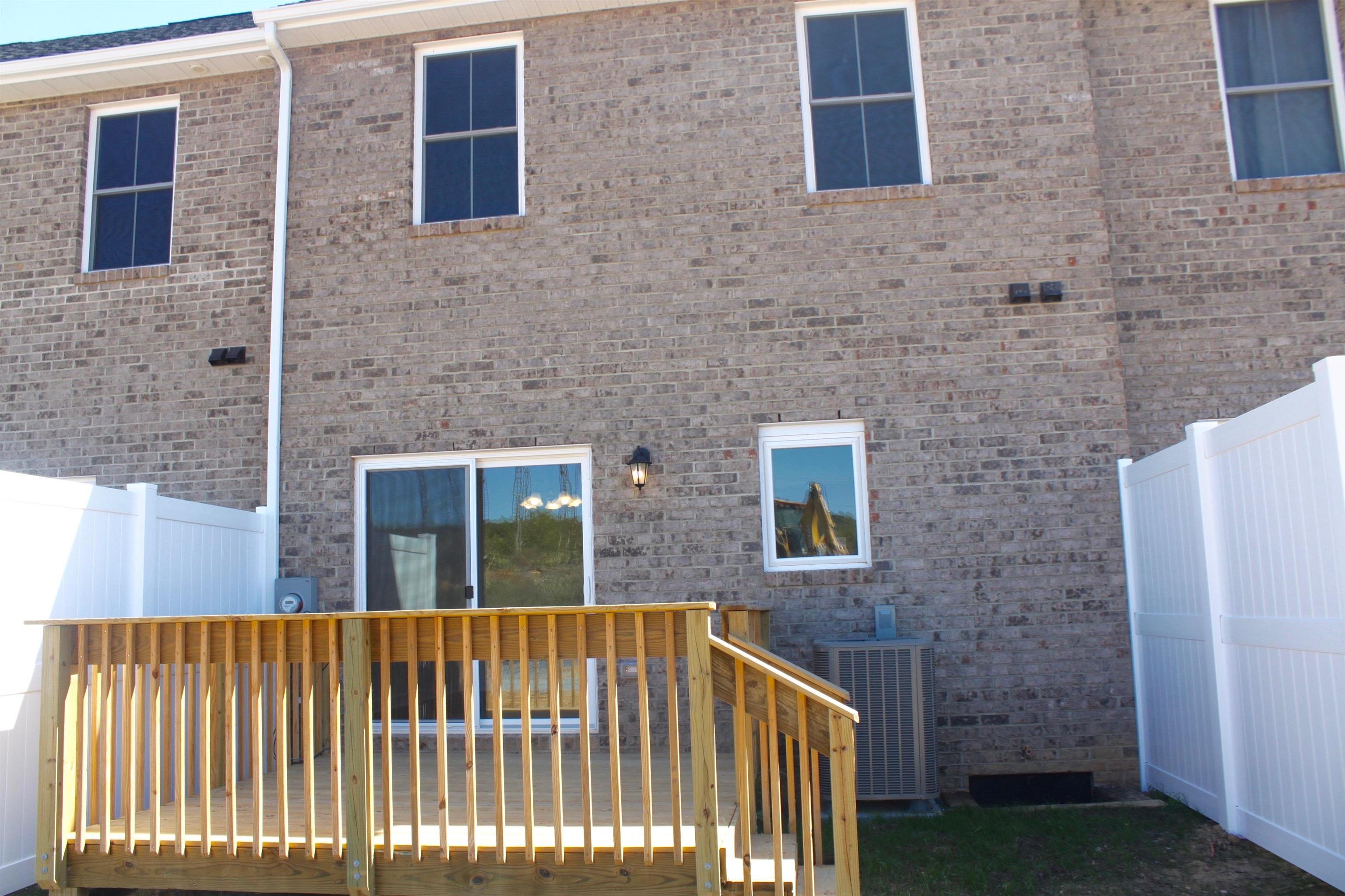 113 Cedar Point Lane Harrisonburg, VA 22802 - Photo 25 of 25 a view of a brick house with large windows