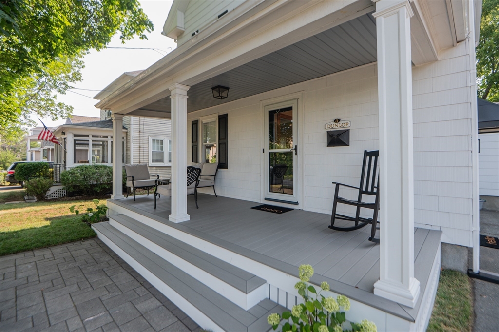 5 Florence Street Danvers, MA 01923 - Photo 2 of 41 a house with garden in front of it