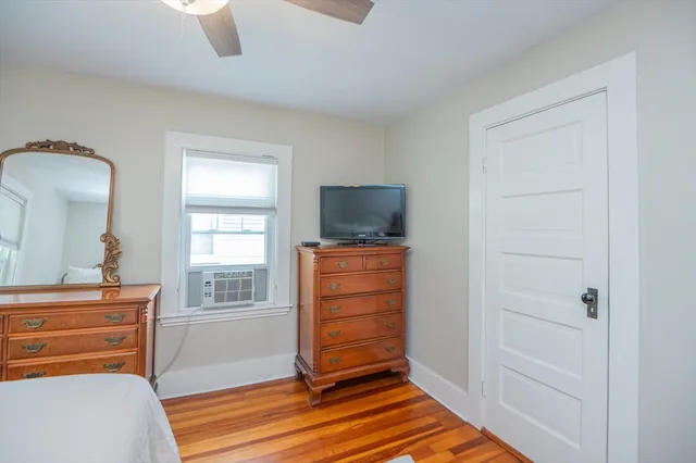 a room with furniture and flat screen tv