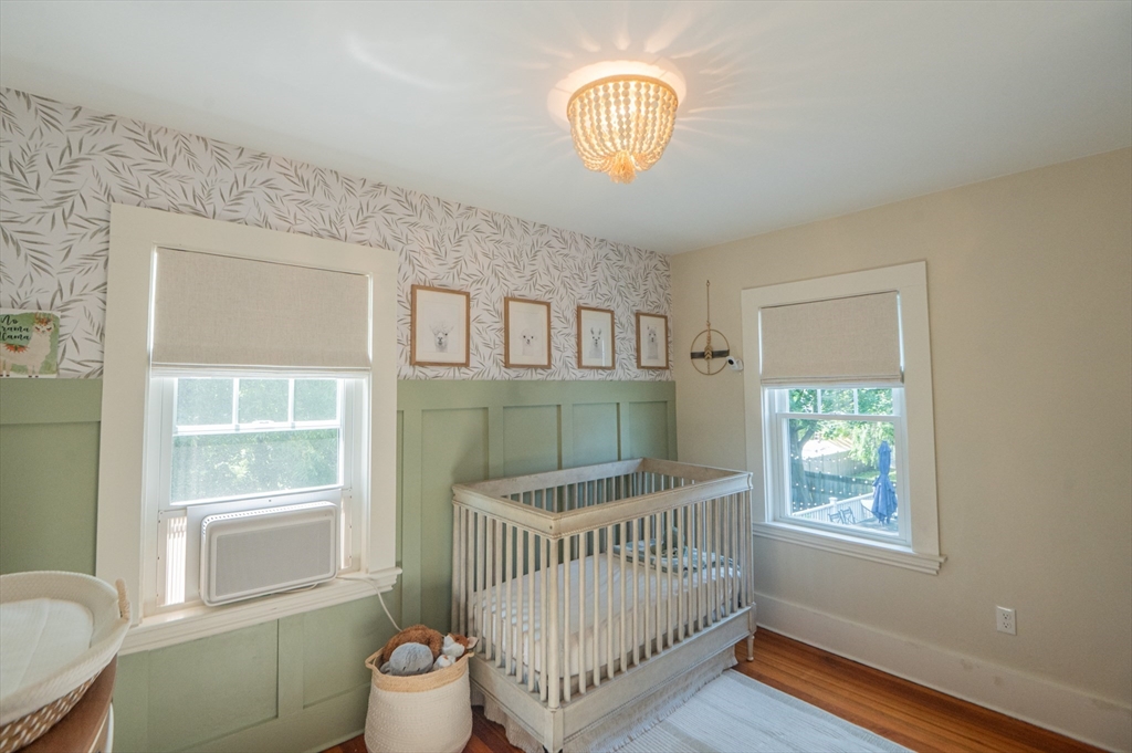 5 Florence Street Danvers, MA 01923 - Photo 30 of 41 a bedroom with a bed and a window