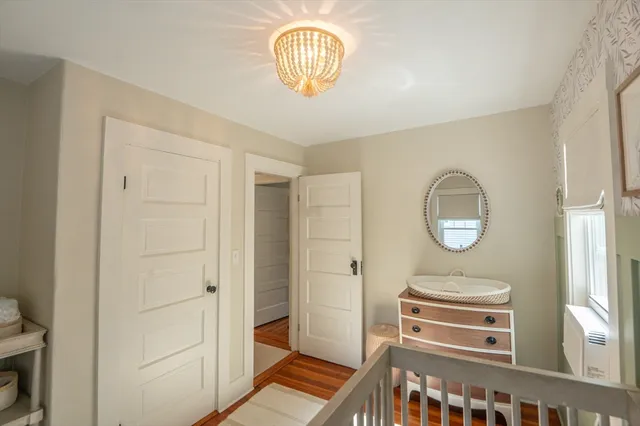 a view of room with car parked