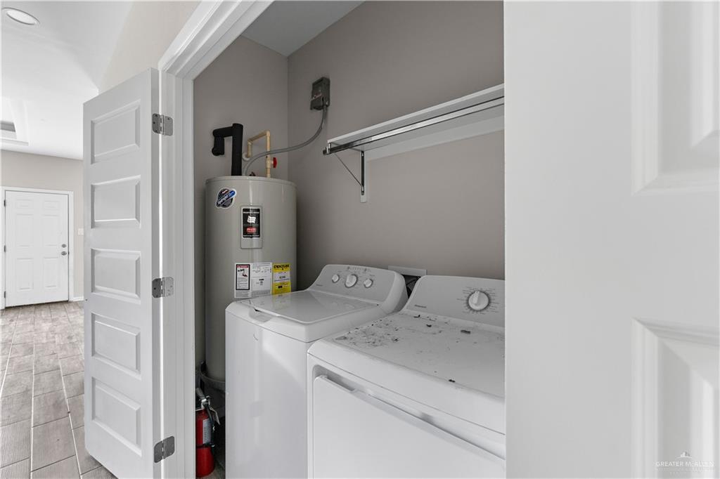 912-3 Kentucky Street Alton, TX 78573 - Photo 13 of 17 a utility room with dryer and washer