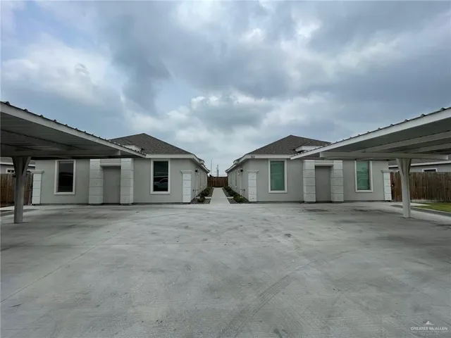 a house with yard in front of it