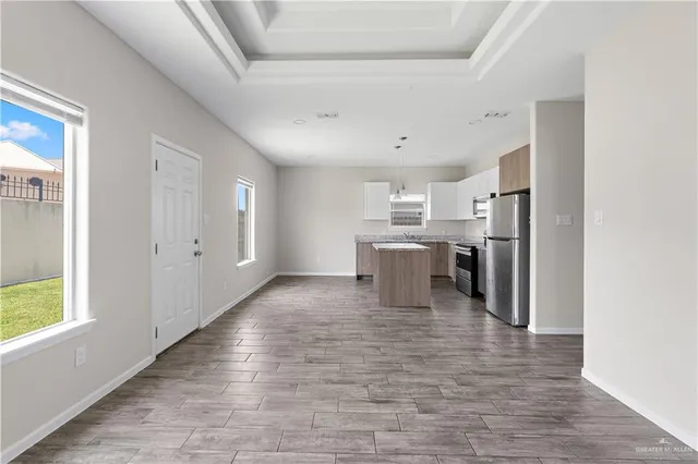 a view of kitchen with wooden floor