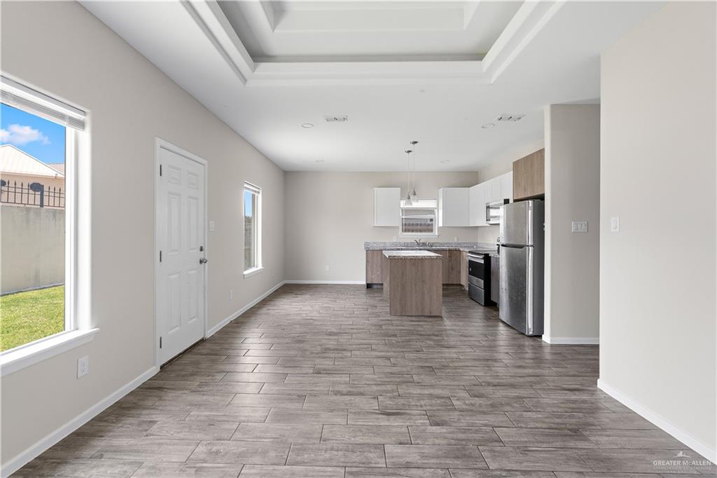 912-3 Kentucky Street Alton, TX 78573 - Photo 2 of 17 a view of kitchen with wooden floor