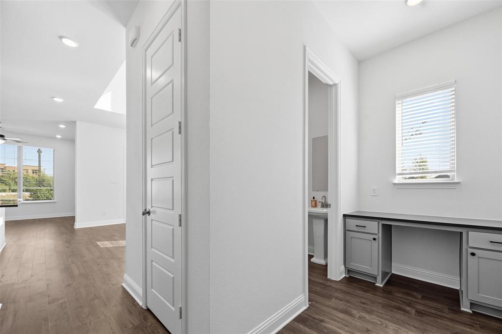 2533 Brunswick Way, Unit 2533 Allen, TX 75013 - Photo 12 of 24 a view of empty room with wooden floor and fan