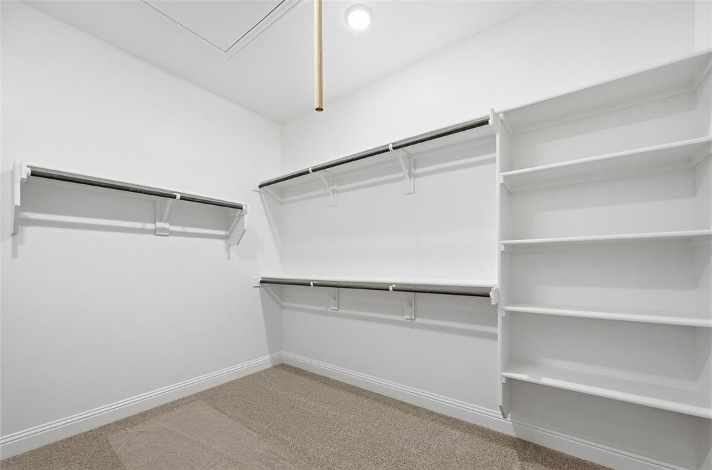 2533 Brunswick Way, Unit 2533 Allen, TX 75013 - Photo 17 of 24 a view of an empty walk in closet