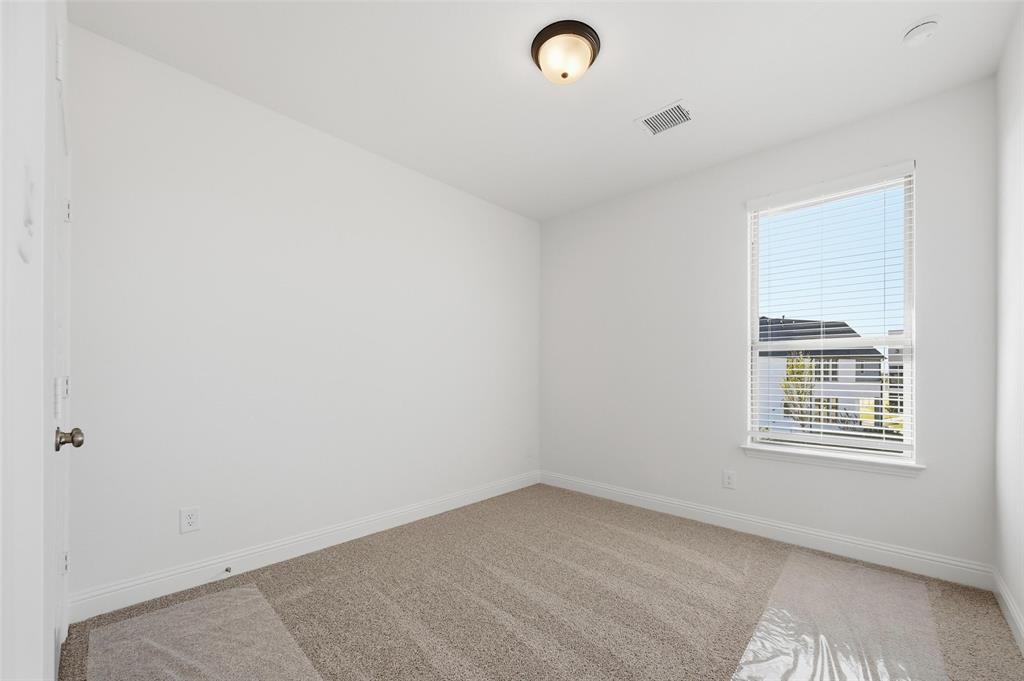 2533 Brunswick Way, Unit 2533 Allen, TX 75013 - Photo 19 of 24 an empty room with a window